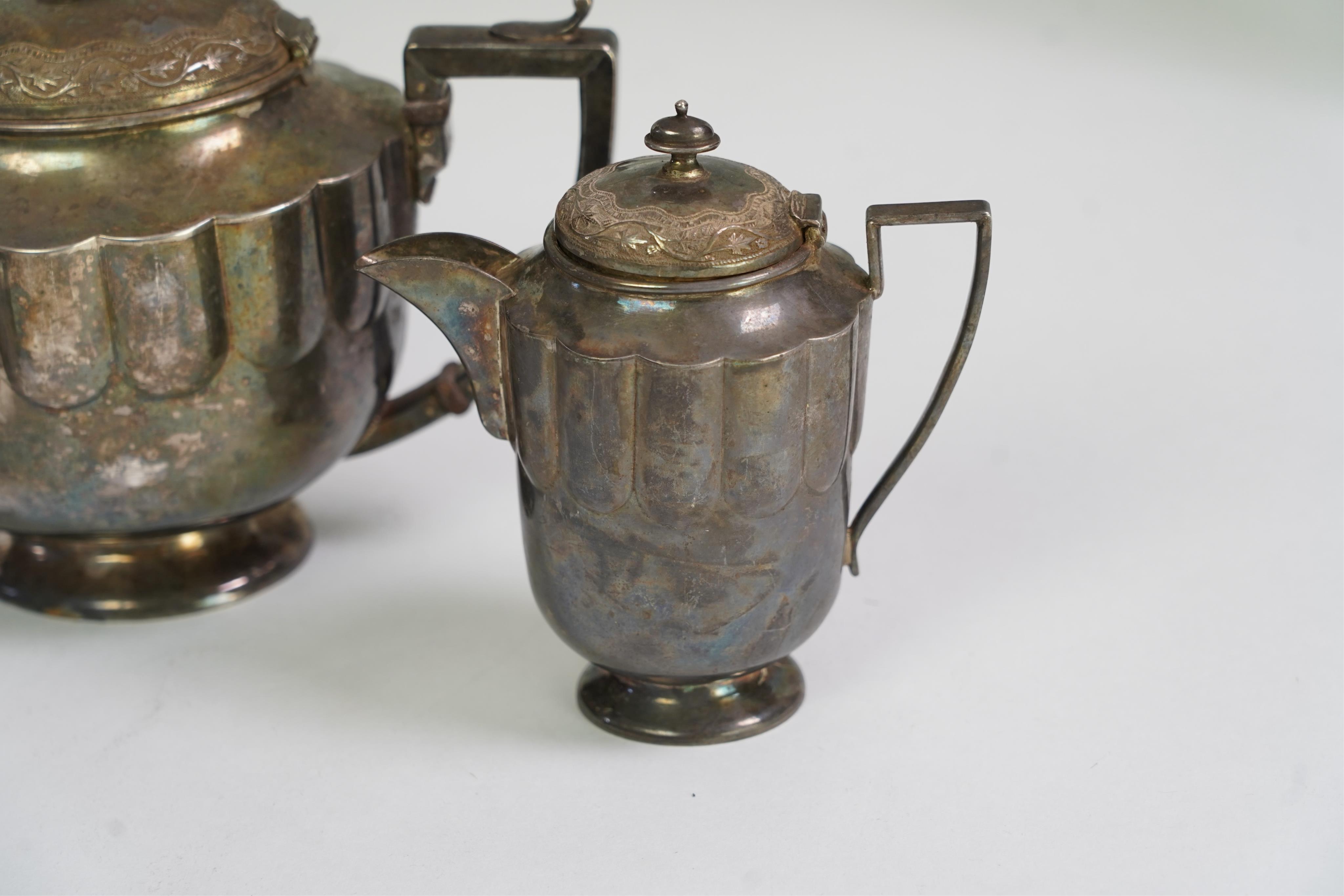 An early 20th century Indian white metal (tests as silver) three piece tea set